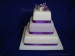 Svatební dort čtverce 3.p. - prostřední fialové patro zdobené royal icing
